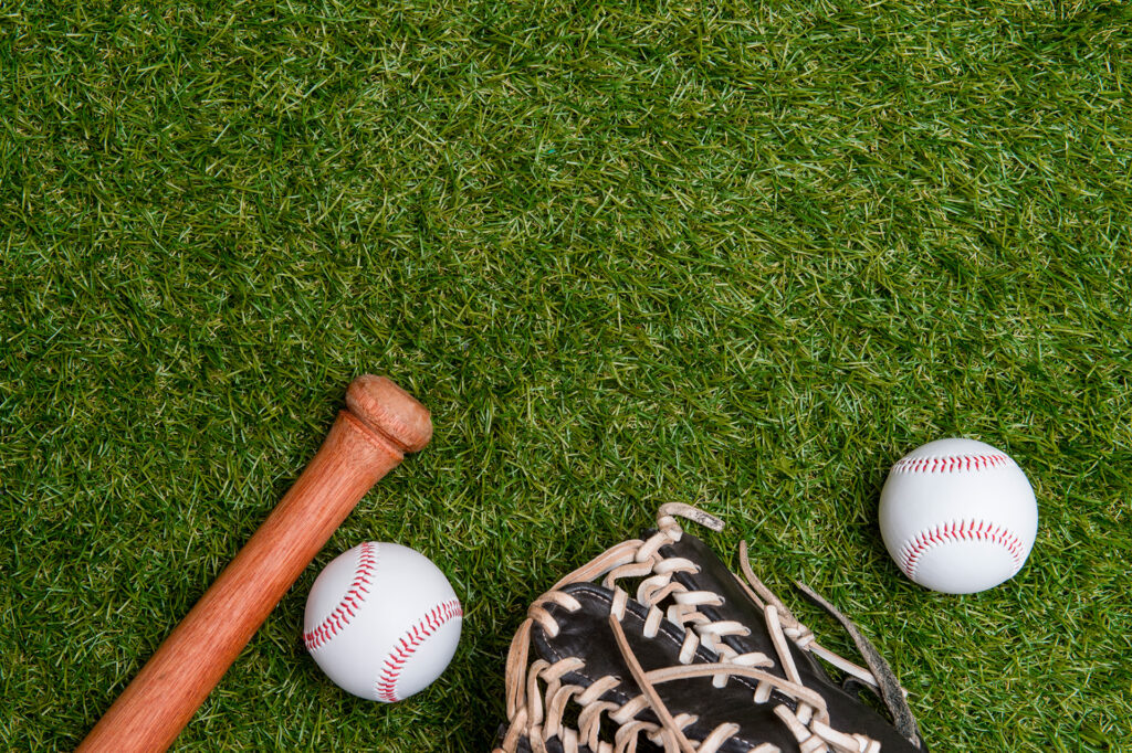 baseball-bat-glove-ball-green-grass-field-Web2